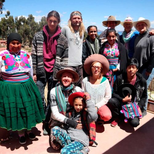 A group of people posing and smiling for the camera